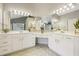 Large bathroom with double vanity and corner sink at 575 Maple Crest Dr, Lawrenceville, GA 30044