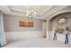 Bright dining room with chandelier and decorative wall art at 575 Maple Crest Dr, Lawrenceville, GA 30044