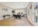 Bright dining room with hardwood floors and access to a patio at 575 Maple Crest Dr, Lawrenceville, GA 30044