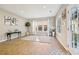 Bright dining room with hardwood floors and access to a patio at 575 Maple Crest Dr, Lawrenceville, GA 30044