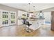 Modern kitchen featuring white cabinets and granite countertops at 575 Maple Crest Dr, Lawrenceville, GA 30044