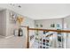 Upstairs hallway overlooking the main living area at 575 Maple Crest Dr, Lawrenceville, GA 30044