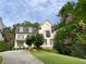 Two-story house with white siding, black shutters, and a landscaped lawn at 2619 Green Meadows Ln, Brookhaven, GA 30319