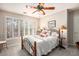 Bright bedroom featuring a comfortable bed and ample natural light at 425 Abbeywood Dr, Roswell, GA 30075