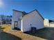 House exterior with white siding and landscaping at 916 Hunt Rd, Jonesboro, GA 30236