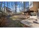 Spacious backyard with a wooden fence, offering plenty of room for outdoor activities at 1379 Chatley Way, Woodstock, GA 30188