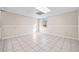 Finished basement boasts neutral walls, tile flooring, and window at 1379 Chatley Way, Woodstock, GA 30188