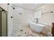 Modern bathroom with tiled shower, soaking tub, and stylish fixtures at 1379 Chatley Way, Woodstock, GA 30188