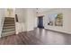 Welcoming foyer with hardwood floors and staircase at 1379 Chatley Way, Woodstock, GA 30188
