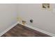 Laundry room with vinyl flooring and hookups for washer and dryer at 1379 Chatley Way, Woodstock, GA 30188