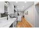 Modern kitchen with white cabinets, quartz countertops, and stainless steel appliances at 1252 Kingsview Se Cir, Smyrna, GA 30080