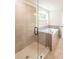 Modern bathroom with a frameless glass shower and a soaking tub at 2626 Radvell Ct, Decatur, GA 30034