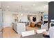 Open kitchen with island and view to living areas at 3249 Shirecrest Ln, Dacula, GA 30019