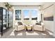 Peaceful sitting area with two armchairs and a large window at 3249 Shirecrest Ln, Dacula, GA 30019