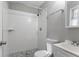 Clean bathroom with shower, toilet and pedestal sink at 3578 Adkins Nw Rd, Atlanta, GA 30331