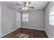 Bedroom with hardwood floors, ceiling fan, and window with blinds at 3578 Adkins Nw Rd, Atlanta, GA 30331