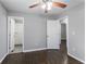 Bedroom with hardwood floors, and access to bathroom and other rooms at 3578 Adkins Nw Rd, Atlanta, GA 30331