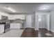 Updated kitchen with white cabinets and stainless steel appliances at 3578 Adkins Nw Rd, Atlanta, GA 30331