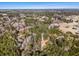 Aerial view of property showing surrounding land and distant homes at 5275 Johnson Spur, Loganville, GA 30052