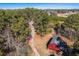 Aerial view showing home, barn, and surrounding property at 5275 Johnson Spur, Loganville, GA 30052