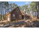 Brick home showcasing a side view with attached garage at 5275 Johnson Spur, Loganville, GA 30052