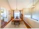 Bright dining room with chandelier and hardwood floors at 5955 Shannon Dr, Cumming, GA 30040