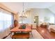 Bright dining room with chandelier and hardwood floors at 5955 Shannon Dr, Cumming, GA 30040