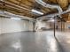 Unfinished basement with high ceilings and ample storage at 2402 Highway 138 Sw, Conyers, GA 30094