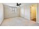 Well-lit bedroom with private bathroom access at 2402 Highway 138 Sw, Conyers, GA 30094
