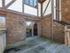 Wooden deck with double doors leading inside at 2402 Highway 138 Sw, Conyers, GA 30094