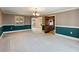 Elegant dining room showcasing hardwood floors and a view into the kitchen at 2402 Highway 138 Sw, Conyers, GA 30094