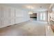 Spacious dining room with wall paneling and fireplace at 2402 Highway 138 Sw, Conyers, GA 30094