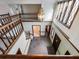 Two-story entryway with chandelier and tile floor at 2402 Highway 138 Sw, Conyers, GA 30094