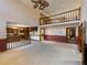 Living Room with high ceiling, balcony and hardwood floor at 2402 Highway 138 Sw, Conyers, GA 30094
