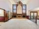 High-ceiling living room with fireplace and hardwood floors at 2402 Highway 138 Sw, Conyers, GA 30094