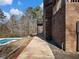 Wooden walkway alongside the home leading to the pool at 2402 Highway 138 Sw, Conyers, GA 30094