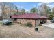 Brick house with attached garage and large yard at 4055 Thaxton Rd, Atlanta, GA 30349