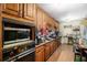 Kitchen with wood cabinets and granite countertops at 4055 Thaxton Rd, Atlanta, GA 30349