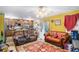 Open living area with a kitchen and leather couches at 4055 Thaxton Rd, Atlanta, GA 30349