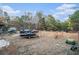 Boat and vehicles parked in the side yard at 4055 Thaxton Rd, Atlanta, GA 30349
