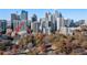 Aerial view showcasing a mid-rise building in a vibrant city setting at 1058 Piedmont Ne Ave # 302, Atlanta, GA 30309