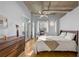 Spacious bedroom with hardwood floors, ample natural light, and private balcony access at 1058 Piedmont Ne Ave # 302, Atlanta, GA 30309