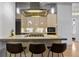 Modern kitchen island with breakfast bar and stainless steel appliances at 1058 Piedmont Ne Ave # 302, Atlanta, GA 30309