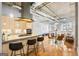 Stylish kitchen with stainless steel appliances, island seating, and an open view to the living area at 1058 Piedmont Ne Ave # 302, Atlanta, GA 30309