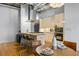 Well-lit kitchen featuring stainless appliances, modern cabinetry, and an island with bar seating at 1058 Piedmont Ne Ave # 302, Atlanta, GA 30309
