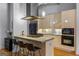 Contemporary kitchen with sleek cabinetry, stainless steel appliances, and a functional island for cooking at 1058 Piedmont Ne Ave # 302, Atlanta, GA 30309