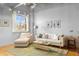 Relaxing living room with comfortable seating and large window at 1058 Piedmont Ne Ave # 302, Atlanta, GA 30309