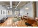 Bright living room featuring hardwood floors and ample natural light at 1058 Piedmont Ne Ave # 302, Atlanta, GA 30309