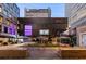 Outdoor plaza with seating and a large screen at 1058 Piedmont Ne Ave # 302, Atlanta, GA 30309