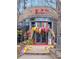 Vibrant restaurant entrance with colorful floral decor at 1058 Piedmont Ne Ave # 302, Atlanta, GA 30309